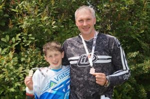 Igor and Max Ganakovsky proudly show off their medals earned at the Alberta BMX Provincial Races.