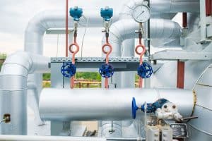 Cogeneration Advantages and Disadvantages - pipes at a cogeneration plant