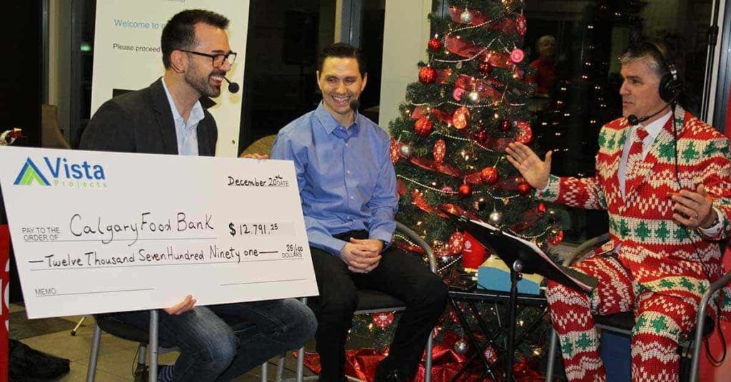 Chad Radke and Erwin Vargas CBC donation