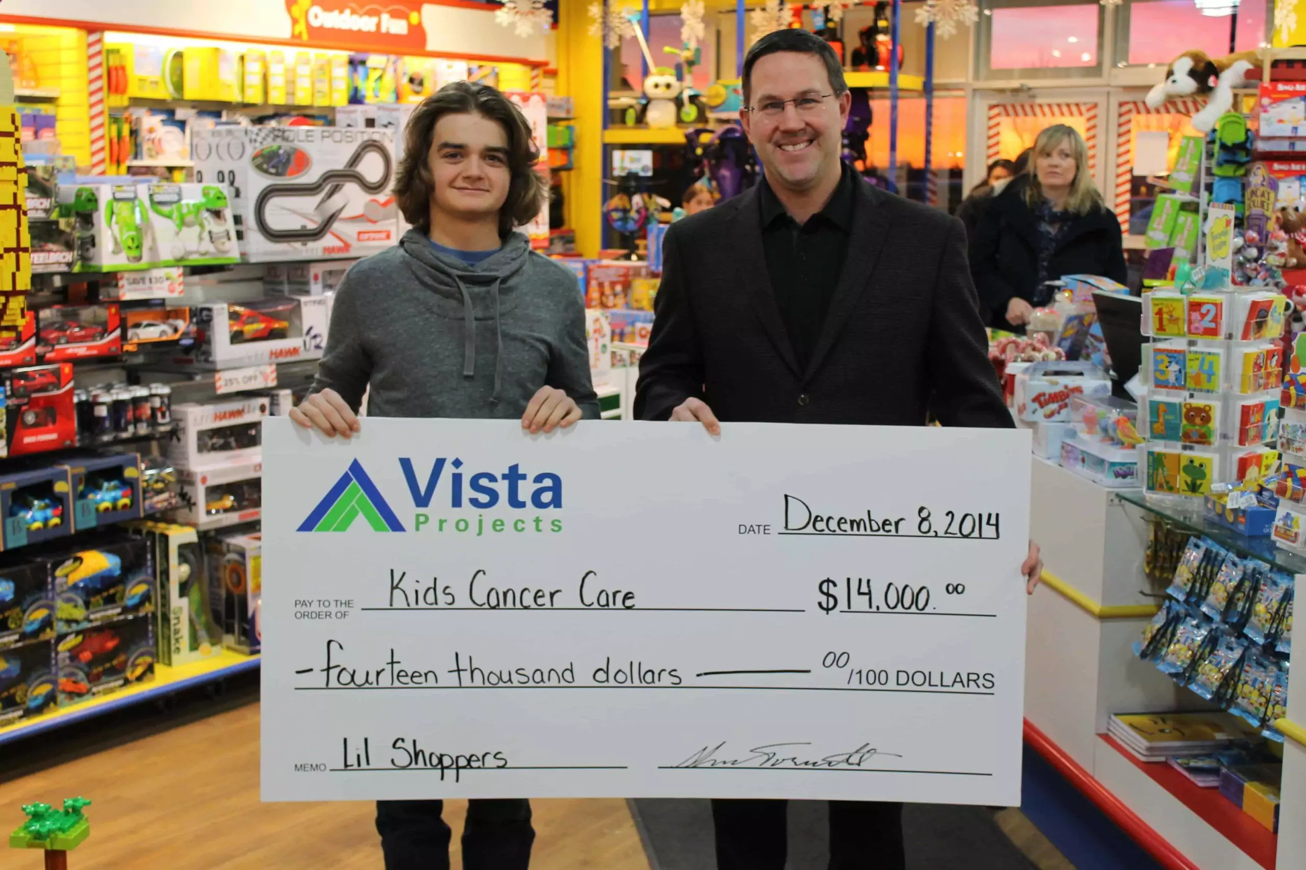 Vista's Shane Torwalt (right) presented the cheque to Campbell Laidlaw, the spokesman for Kids Cancer Care. 