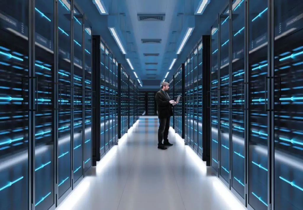 man standing in a server room