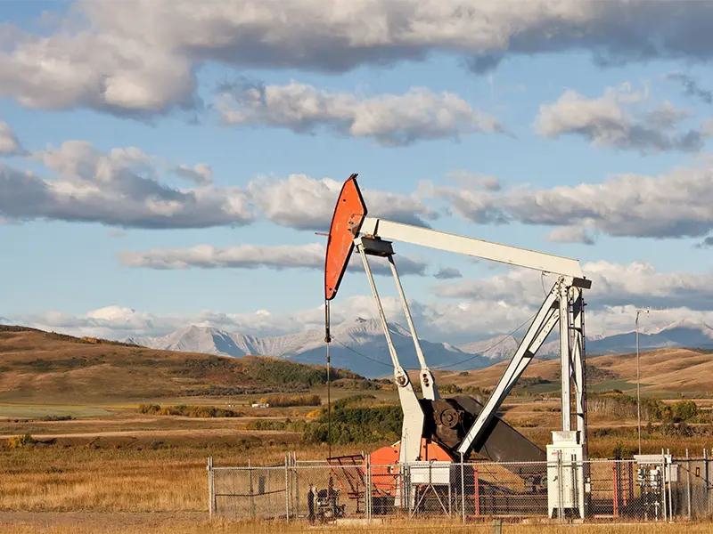 oil pump jack in Alberta landscape