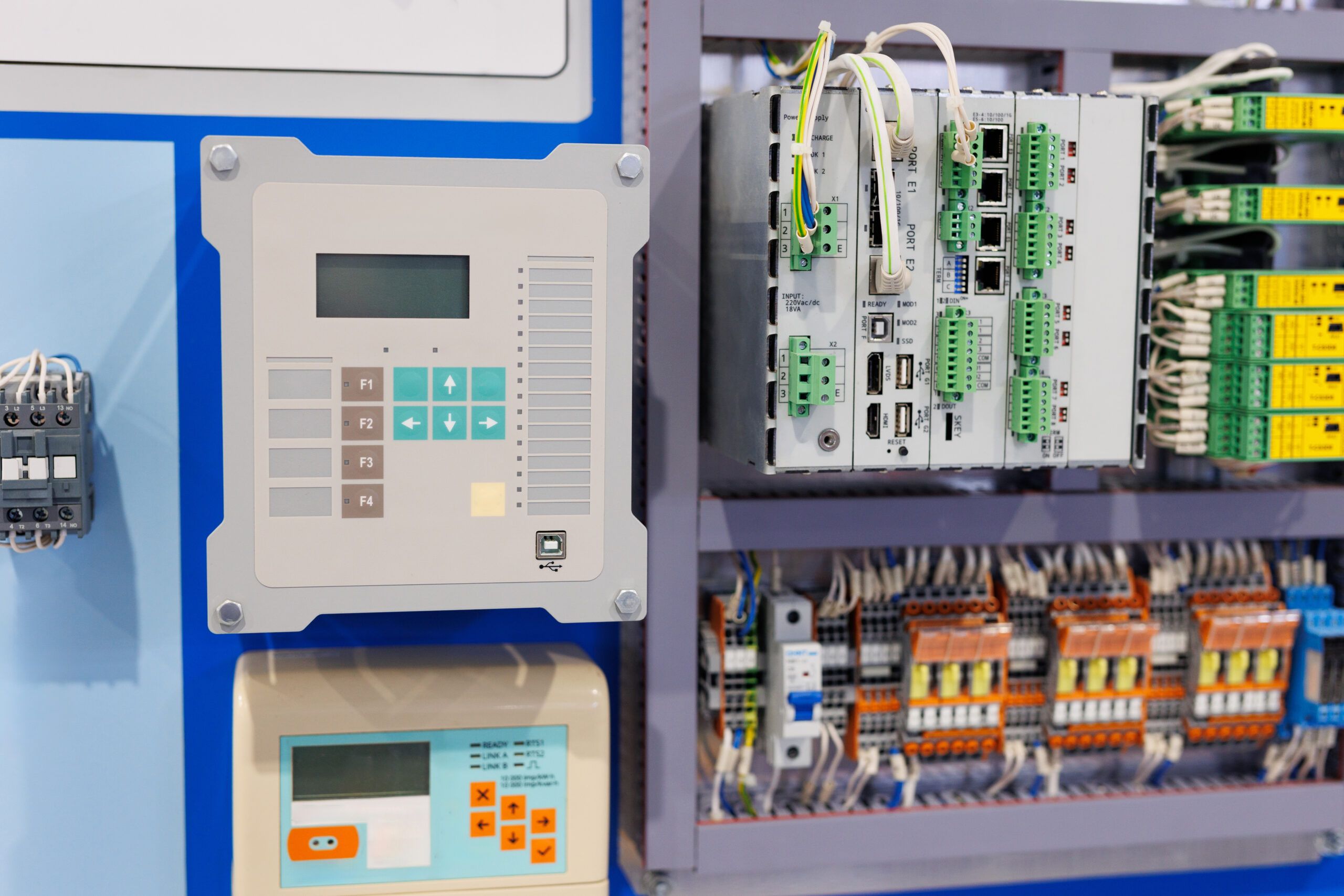 Programmable Logic Controller system with wiring, I/O modules, and control panel used in industrial automation troubleshooting.